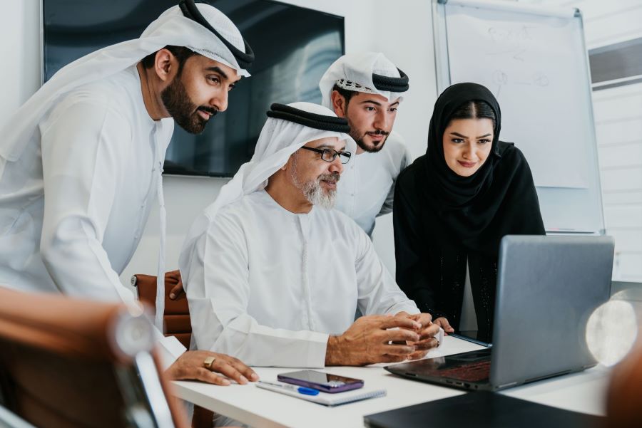 People at work looking at laptop